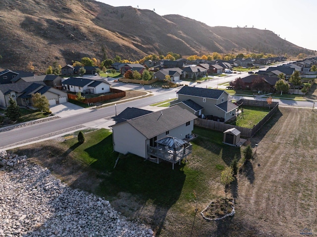 bird's eye view featuring a mountain view and a residential view