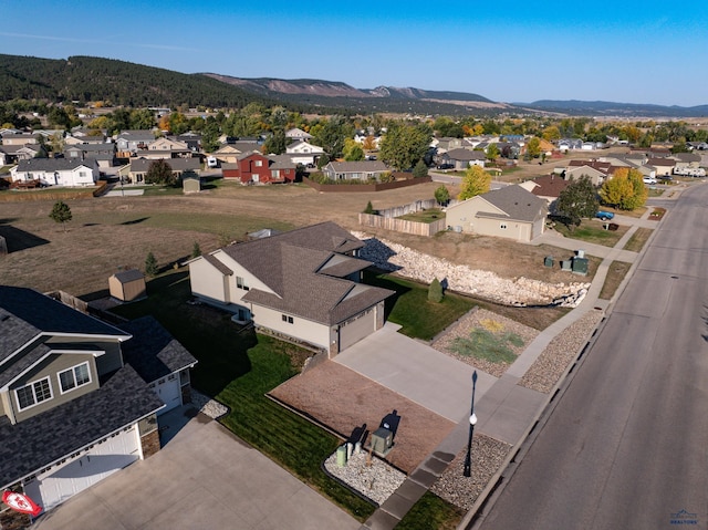 aerial view with a mountain view and a residential view