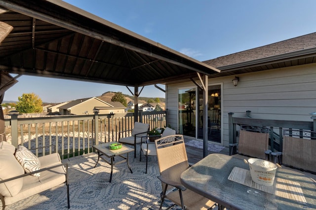 view of patio / terrace with a gazebo and outdoor dining area
