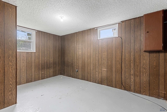 1937 Hillsview Dr, Rapid City, SD 57702 - below grade area with wood walls and plenty of natural light