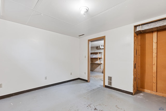 1937 Hillsview Dr, Rapid City, SD 57702 - unfurnished bedroom with concrete flooring and baseboards
