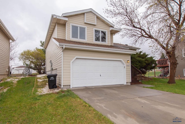 4028 Prairie View Dr, Rapid City, SD 57701 - view of front of house featuring concrete driveway, stairs, a garage, and a front lawn