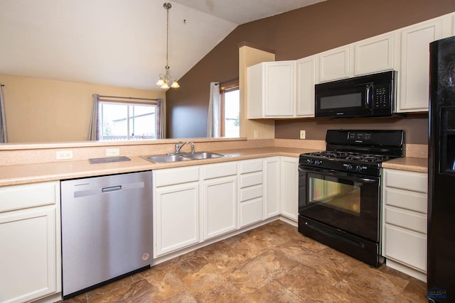 4028 Prairie View Dr, Rapid City, SD 57701 - kitchen featuring vaulted ceiling, black appliances, white cabinets, and a sink
