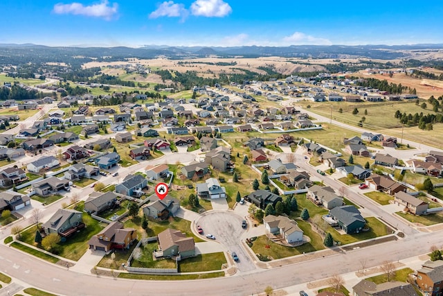 aerial view with a mountain view and a residential view
