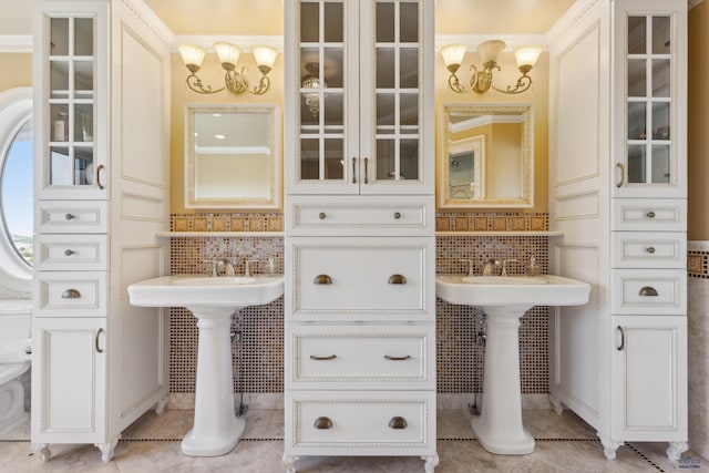 bathroom with tile patterned floors and tile walls