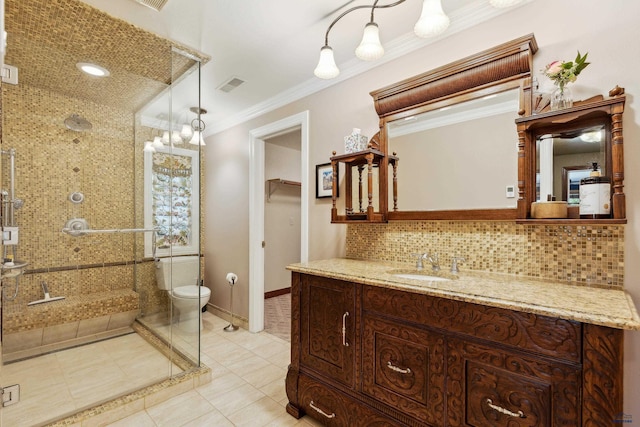 bathroom with backsplash, visible vents, a shower stall, and vanity