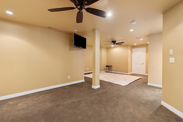 interior space with ceiling fan, dark carpet, recessed lighting, baseboards, and visible vents