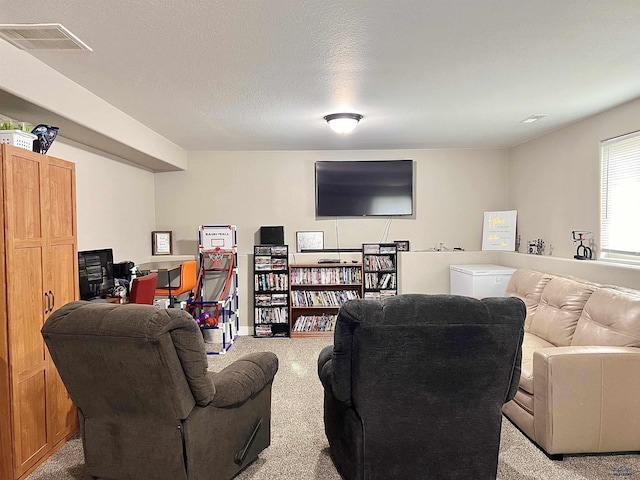 living area with light carpet and visible vents