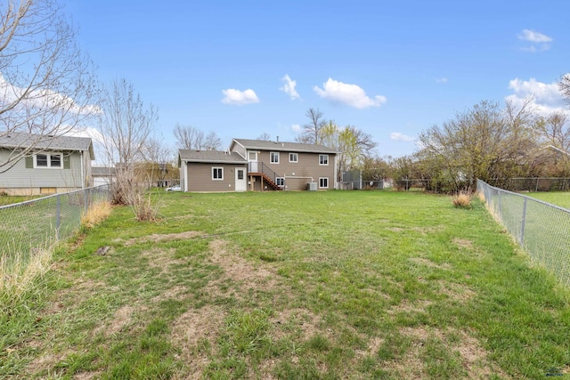 view of yard with a fenced backyard