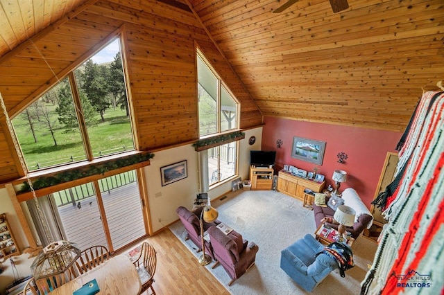 20842 Legacy, Sturgis, SD 57785 - living room with wooden ceiling, a wealth of natural light, and lofted ceiling