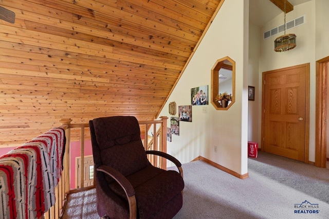 20842 Legacy, Sturgis, SD 57785 - living area featuring carpet, baseboards, wooden ceiling, lofted ceiling, and visible vents