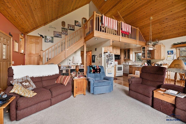 20842 Legacy, Sturgis, SD 57785 - living area with stairs, high vaulted ceiling, wood ceiling, and carpet