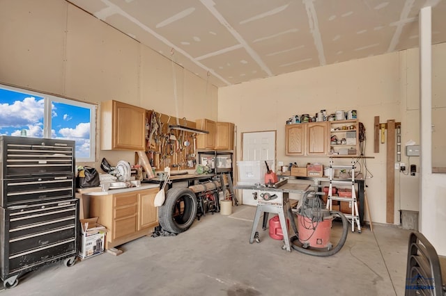 garage with a workshop area