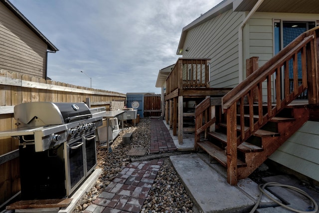 222 E Bengal Dr, Rapid City, SD 57701 - view of patio featuring a fenced backyard and grilling area
