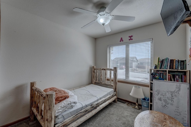222 E Bengal Dr, Rapid City, SD 57701 - bedroom with baseboards, carpet, and ceiling fan