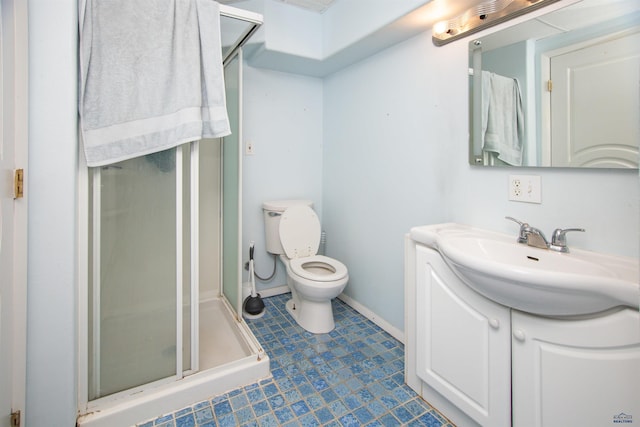 full bath with toilet, tile patterned floors, a shower stall, and vanity