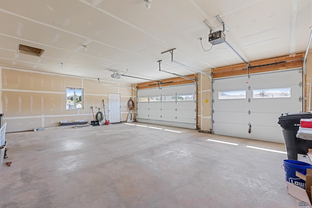 garage featuring a garage door opener