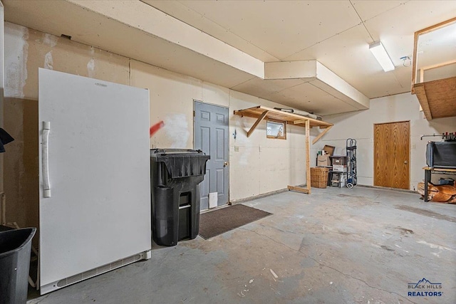 127 Union St, Spearfish, SD 57783 - basement featuring freestanding refrigerator