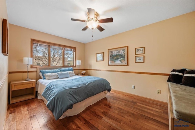 127 Union St, Spearfish, SD 57783 - bedroom featuring a ceiling fan and wood finished floors