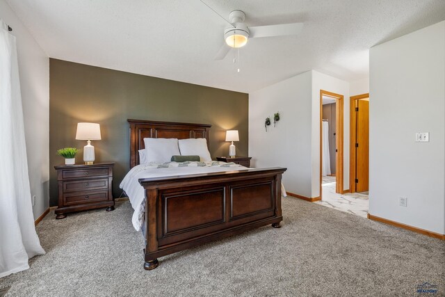 5201 Cale Ct, Rapid City, SD 57701 - bedroom featuring baseboards, a ceiling fan, and light carpet