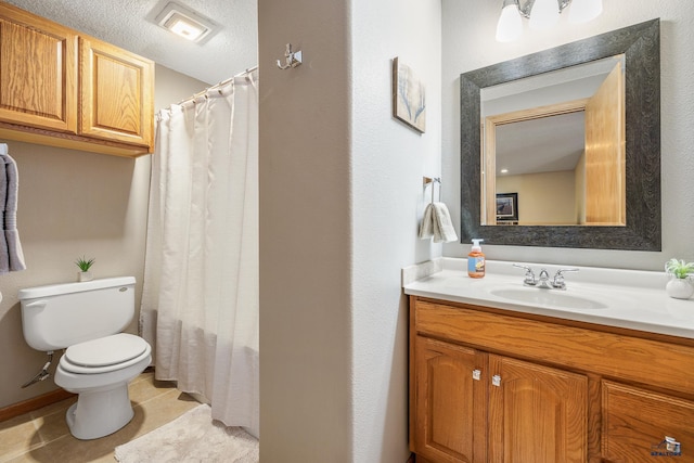 5201 Cale Ct, Rapid City, SD 57701 - full bathroom with tile patterned flooring, toilet, and vanity