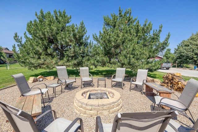 5201 Cale Ct, Rapid City, SD 57701 - view of patio featuring an outdoor fire pit