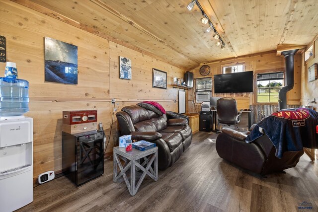5201 Cale Ct, Rapid City, SD 57701 - living room featuring wood ceiling, rail lighting, wood walls, and wood finished floors