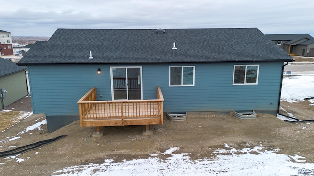 1241 Kenai Dr, Box Elder, SD 57719 - snow covered property featuring a shingled roof and a deck