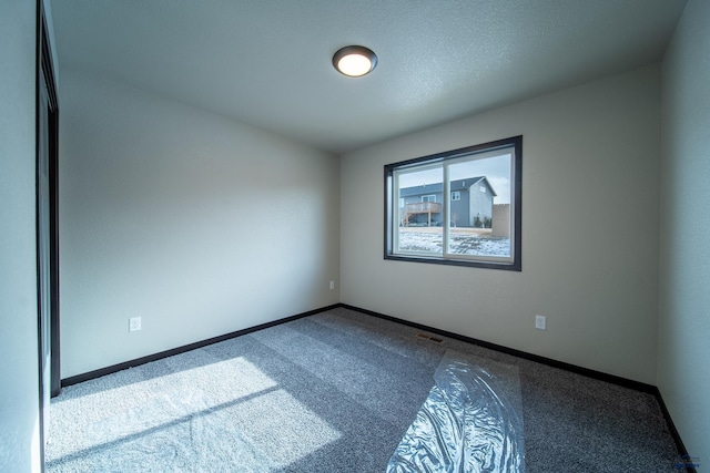 1241 Kenai Dr, Box Elder, SD 57719 - carpeted empty room with baseboards