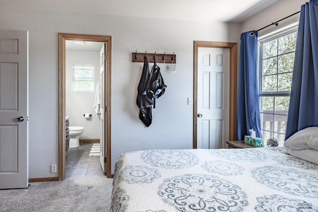 6850 Brighton, Summerset, SD 57718 - bedroom with baseboards, carpet flooring, ensuite bath, and tile patterned floors