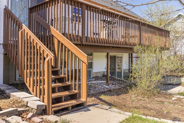 6850 Brighton, Summerset, SD 57718 - rear view of house featuring a shingled roof, a wooden deck, and stairs