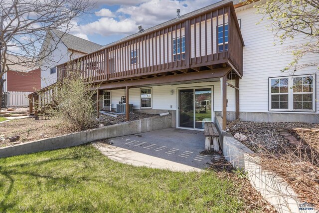 6850 Brighton, Summerset, SD 57718 - rear view of property with central AC, a wooden deck, and a patio area
