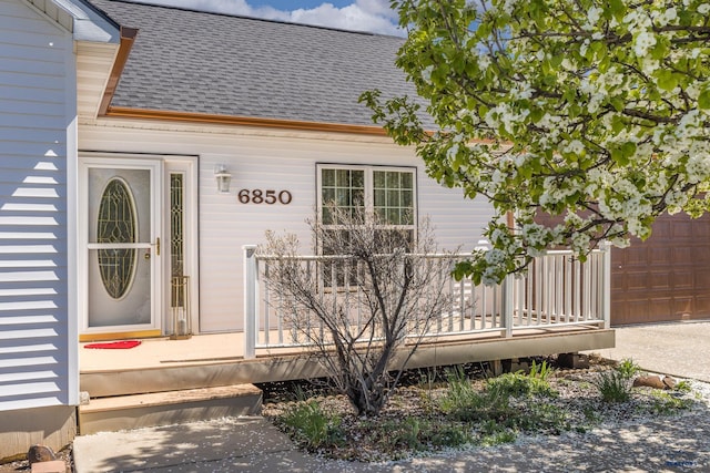 6850 Brighton, Summerset, SD 57718 - property entrance with roof with shingles