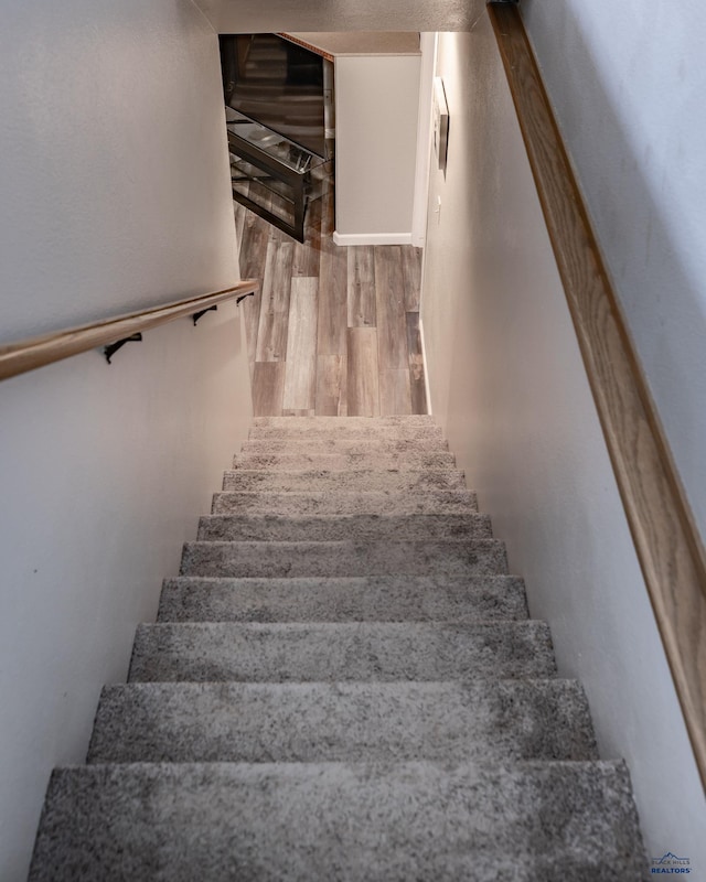 5235 Weathervane Ln, Rapid City, SD 57703 - stairs with wood finished floors