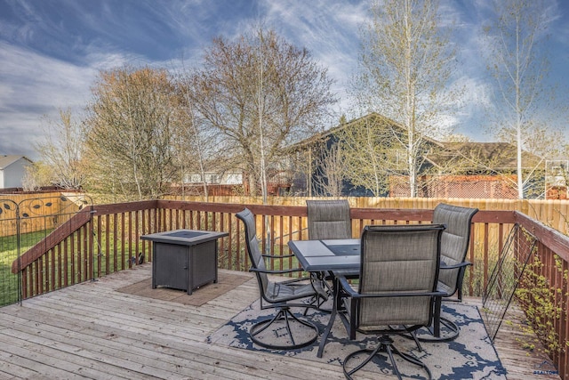 5235 Weathervane Ln, Rapid City, SD 57703 - deck featuring outdoor dining space and a fenced backyard