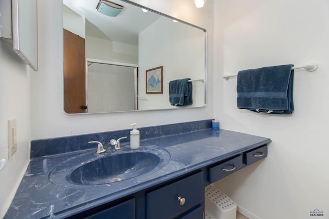 3005 Glenwood Dr, Rapid City, SD 57702 - bathroom with vanity, a shower with door, and visible vents