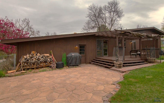 3005 Glenwood Dr, Rapid City, SD 57702 - rear view of house with fence, a wooden deck, and a pergola