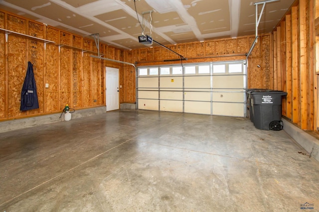garage featuring a garage door opener