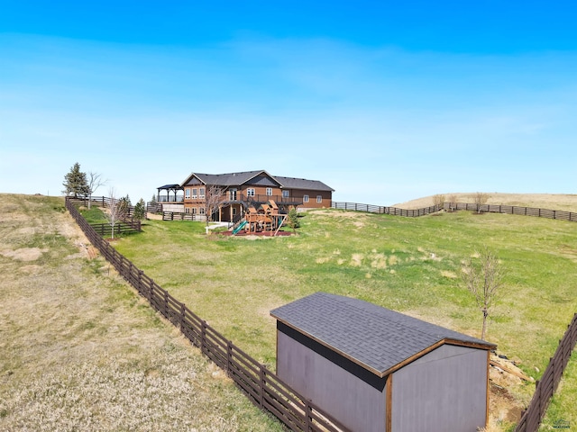 13416 Frontier Loop, Piedmont, SD 57769 - view of yard with a rural view, a fenced backyard, and a playground