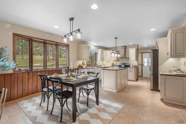 dining room featuring recessed lighting and wainscoting