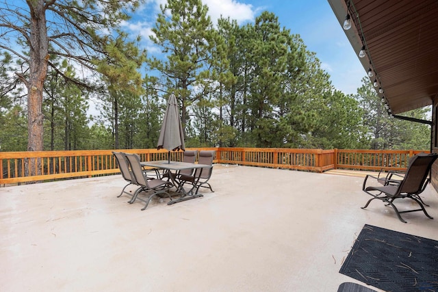 view of patio featuring outdoor dining area