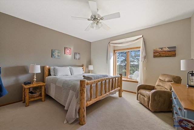 bedroom with baseboards, light carpet, and ceiling fan