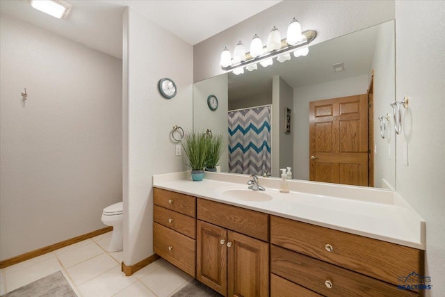 full bath featuring a shower with curtain, tile patterned floors, baseboards, vanity, and toilet