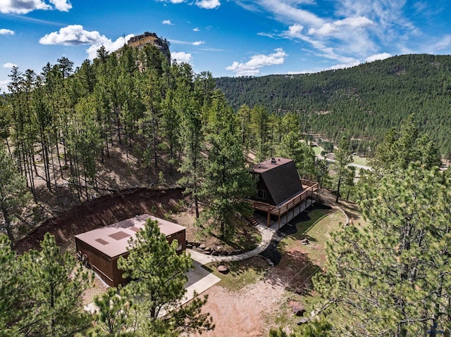 aerial view featuring a view of trees