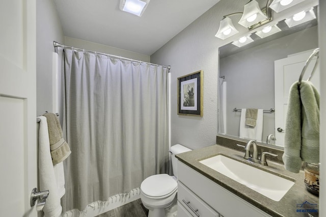 4376 Vinecliff Dr, Rapid City, SD 57701 - full bath featuring vanity, a textured wall, toilet, and a shower with curtain