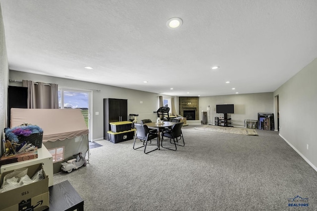 4376 Vinecliff Dr, Rapid City, SD 57701 - interior space with recessed lighting, a textured ceiling, baseboards, and a large fireplace