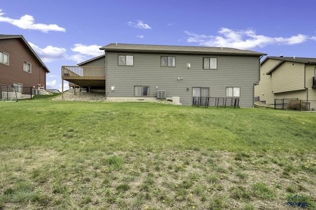 4376 Vinecliff Dr, Rapid City, SD 57701 - back of property featuring fence, a yard, and a wooden deck