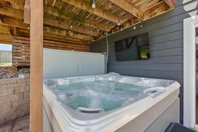 exterior details featuring a hot tub