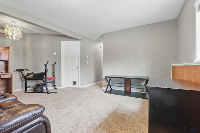 6406 Blue Spruce Ct, Black Hawk, SD 57718 - carpeted living area featuring baseboards and a chandelier
