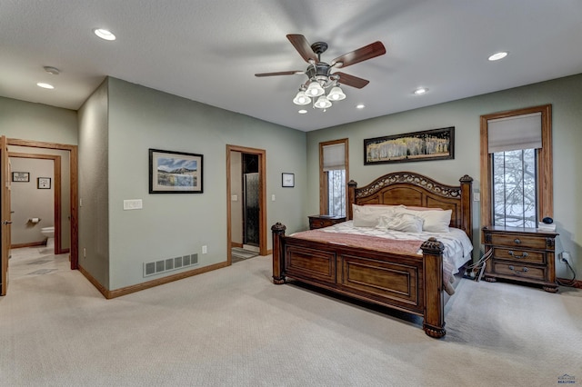 6642 Carnoustie Ct, Rapid City, SD 57702 - bedroom featuring light carpet, baseboards, visible vents, and recessed lighting